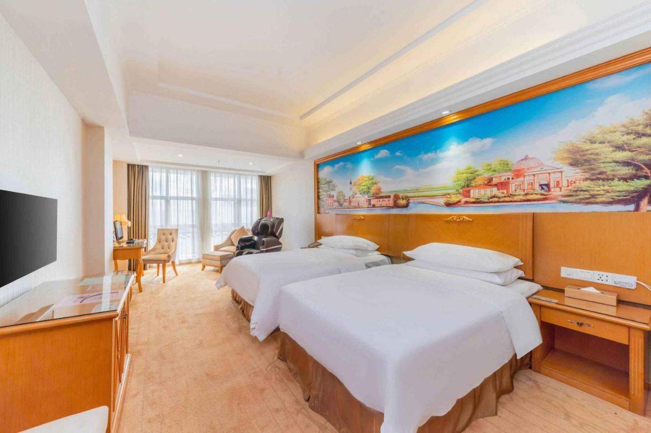 Vienna Hotel Shiyan Guangming Road Шэньчжэнь Экстерьер фото