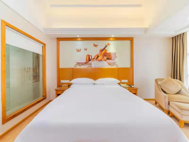 Vienna Hotel Shiyan Guangming Road Шэньчжэнь Экстерьер фото